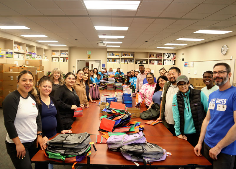 2024 Stuff The Bus Group Volunteers Inside
