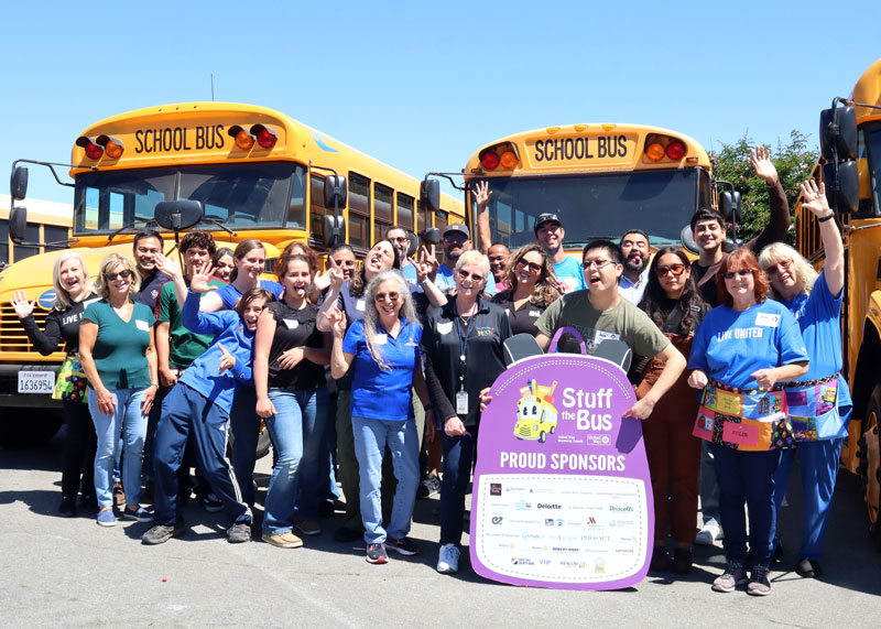 2024 Stuff The Bus Group Volunteers Outside
