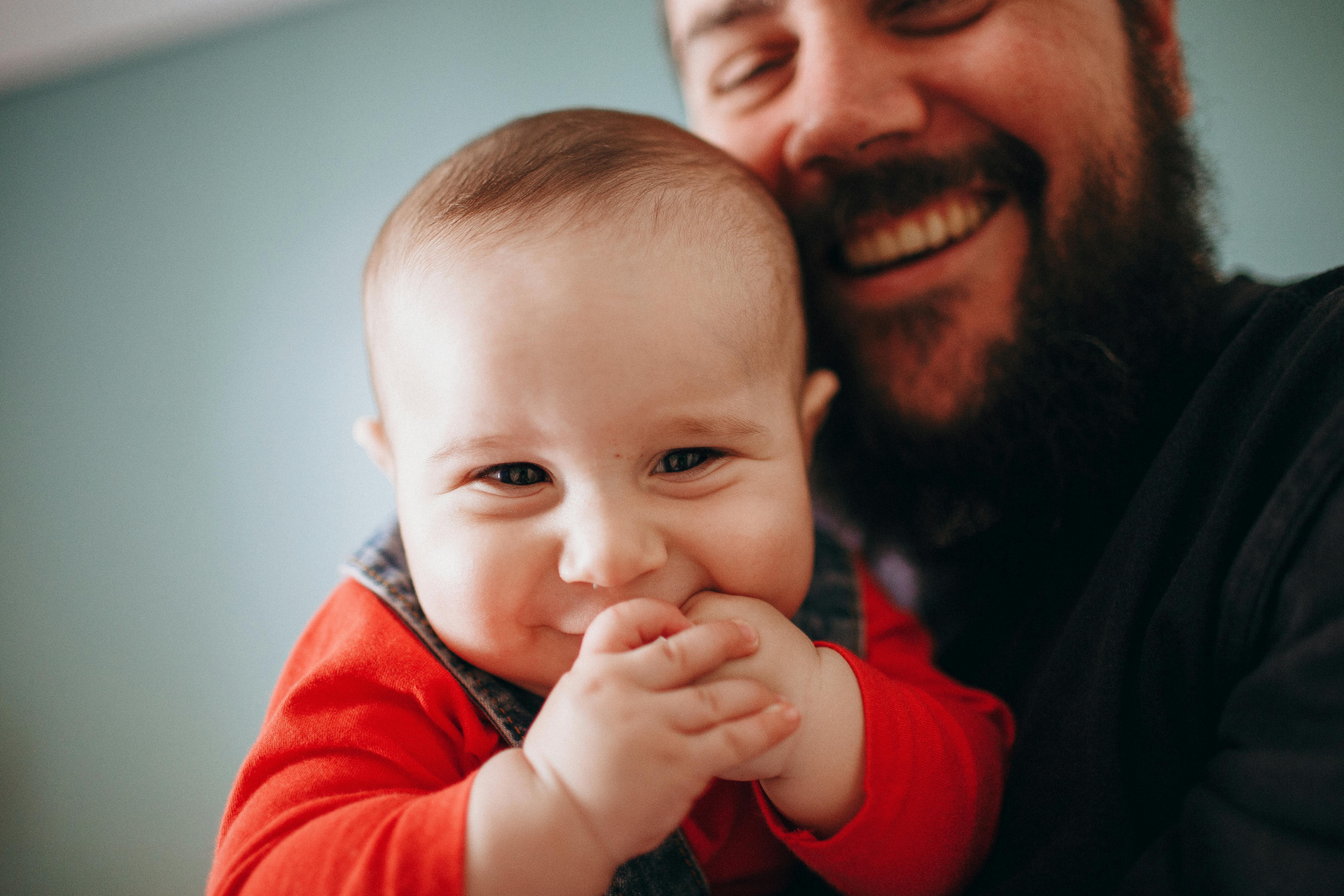 Adult holding a baby